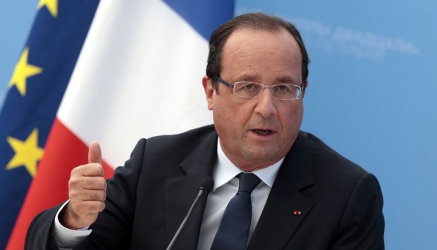 هولاند: اعتداءات باريس خطط لها في سوريا ونظمت في بلجيكا ونفذت في فرنسا